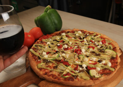 Mediterranean veggie pizza with fresh vegetables and feta from Pitsa Gourmet Pizza Bar Sydney